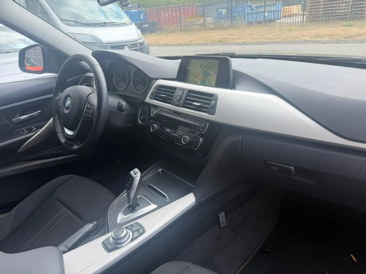 318i Centennial Executive | 3/6 OF 12 MND GARANTIE | NAVI | CLIMA | CRUISE | GOED ONDERHOUDEN |