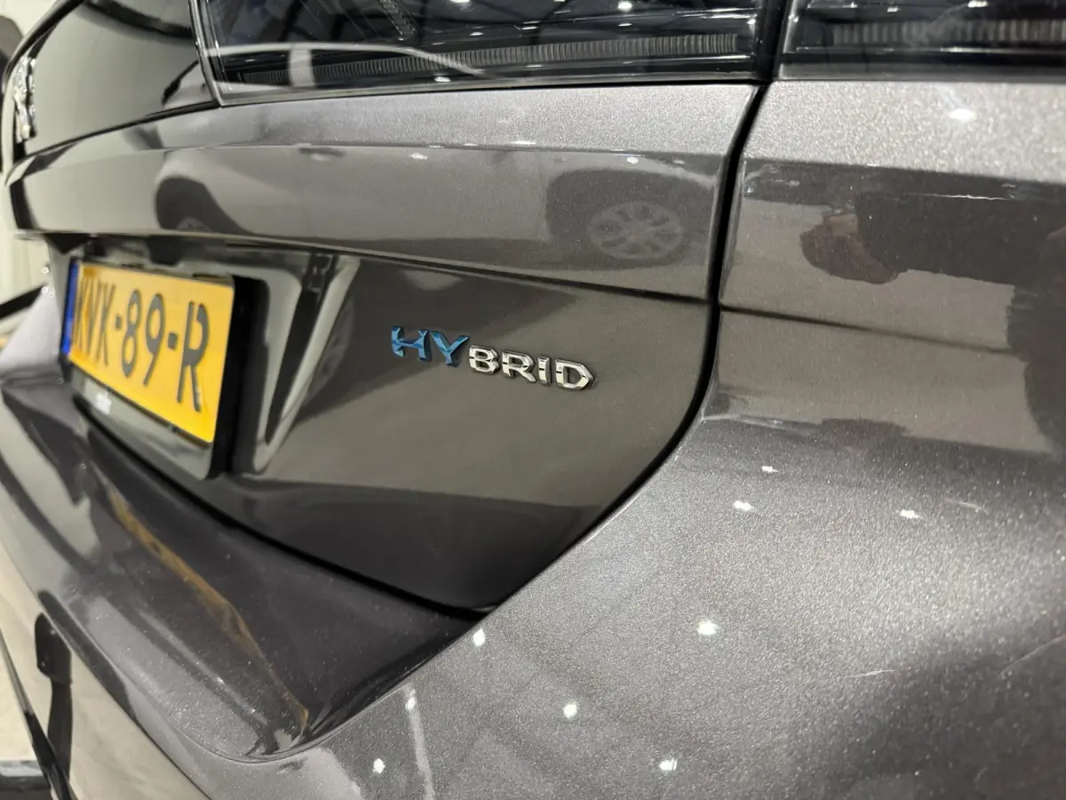 1.6 HYbrid Allure | navi | trekhaak | half-leder |