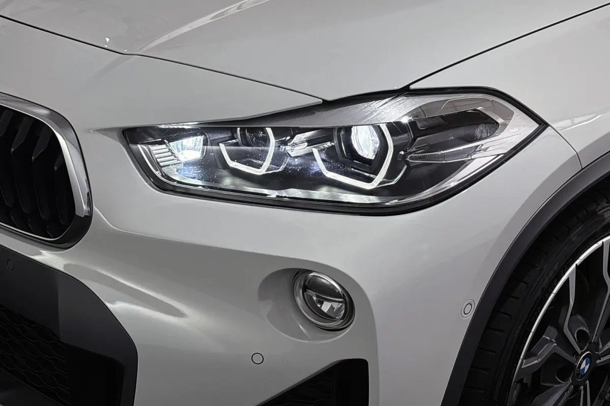 xDrive20i High Executive M Sport X Achteruitrijcamera Head-Up Leder Adaptief Onderstel