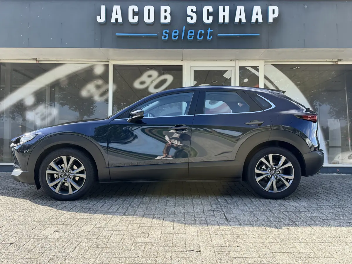 2.0 e-SkyActiv-X M Hybrid Comfort / Keyless / Trekhaak / 18"LM / Carplay / Navi / PDC + Camera