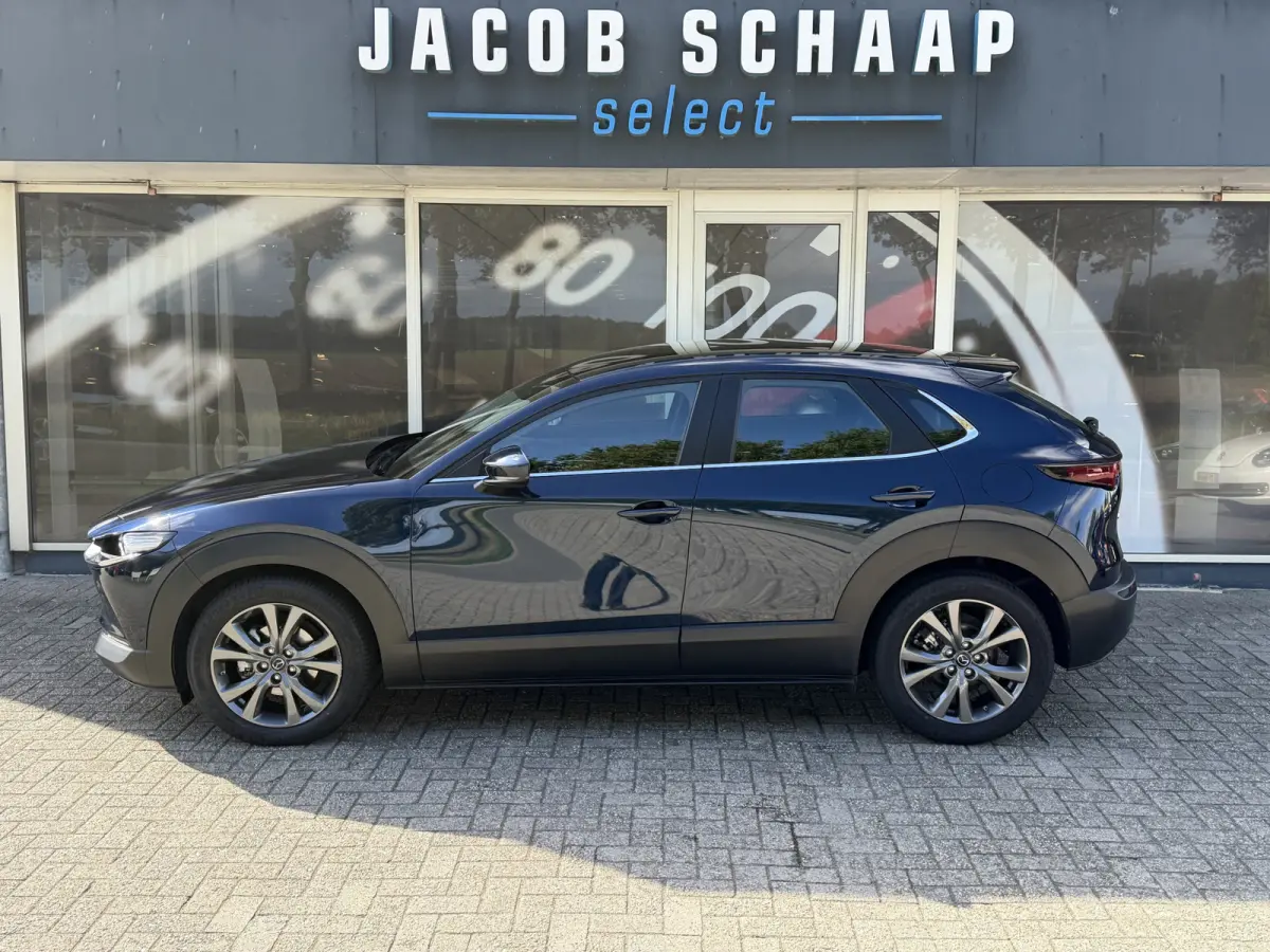 2.0 e-SkyActiv-X M Hybrid Comfort / Keyless / Trekhaak / 18"LM / Carplay / Navi / PDC + Camera