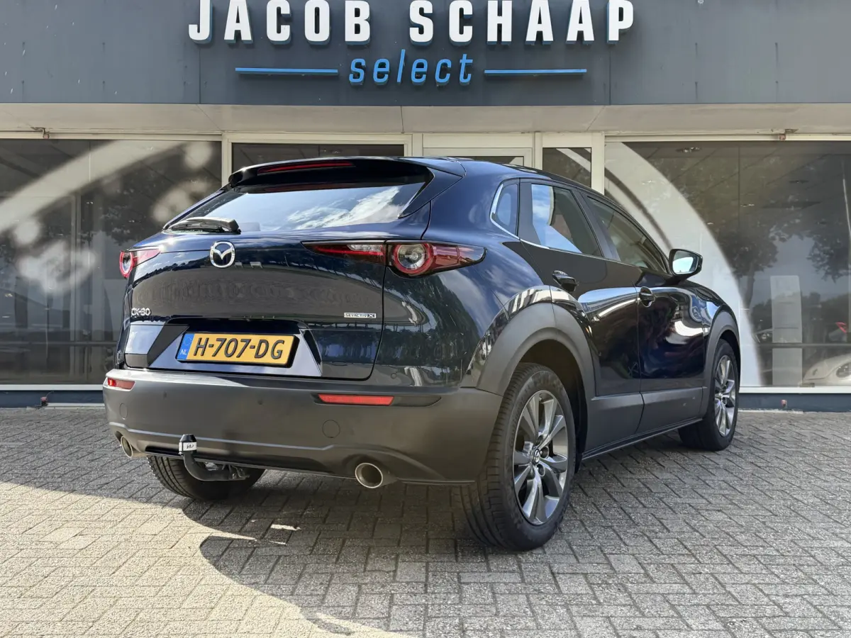 2.0 e-SkyActiv-X M Hybrid Comfort / Keyless / Trekhaak / 18"LM / Carplay / Navi / PDC + Camera