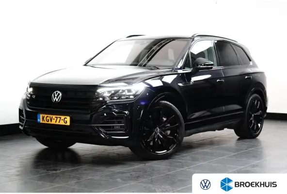 3.0 TSi eHybrid 4MOTION R l Dealeronderhouden l Luchtvering l Pano Dak l Matrix LED l Leder Stoel incl Memory l Elektr. Trekhaak l 21" Suzuka Black l