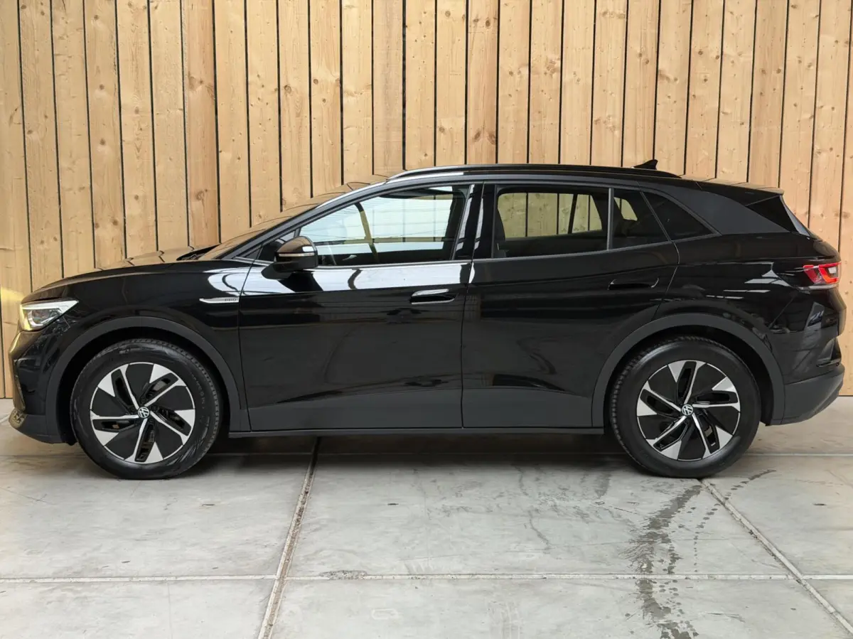 Pro 77 kWh SoH 94,68% | Warmtepomp | Apple CarPlay/Android Auto | Adaptieve cruise control | Climate control | LED koplampen | Navigatiesysteem | Voorstoelen en stuurwiel verwarmd | Parkeers