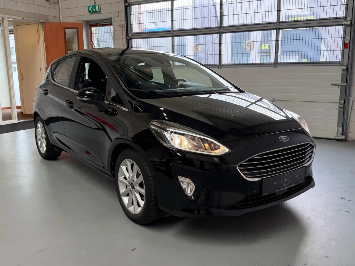 1.0 EcoBoost Titanium Camera, Navi, Airco, Cruise Control, Carplay