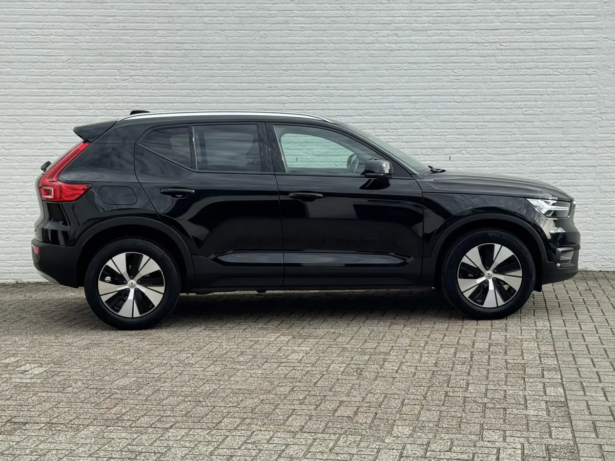 1.5 T2 Momentum Core Achteruitrijcamera Carplay Adaptive Cruise Climate Control Stoel en Stuurverwarming