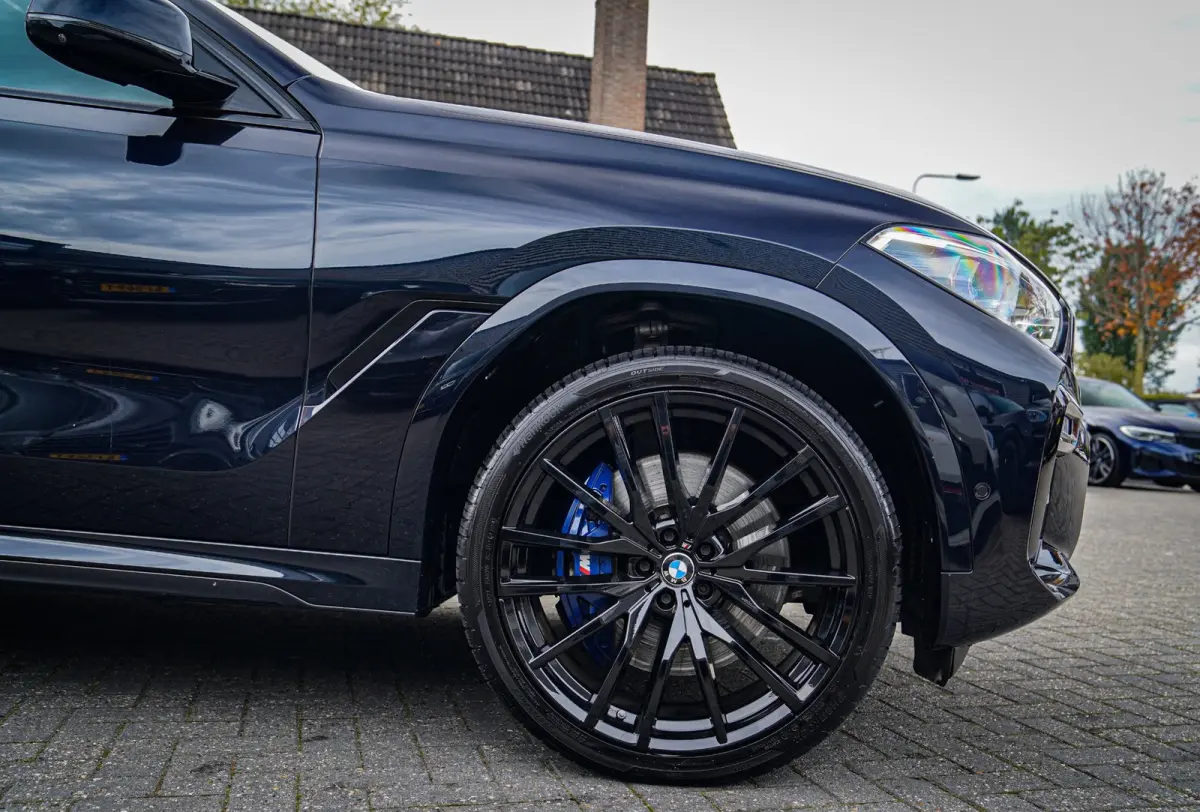 XDrive40i High Executive | Panorama | 360cam | Carbon | Adaptieve cruise control | Kristallen pook | 22 inch | Dealer onder