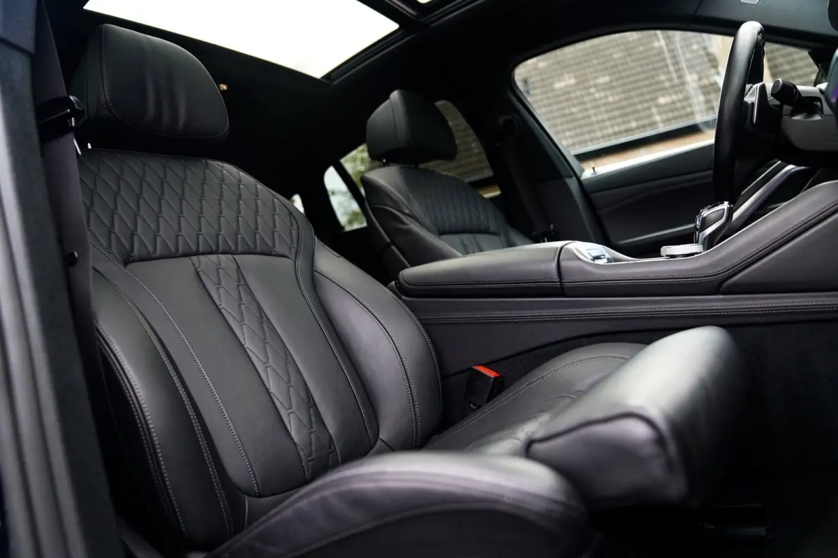 XDrive40i High Executive | Panorama | 360cam | Carbon | Adaptieve cruise control | Kristallen pook | 22 inch | Dealer onder