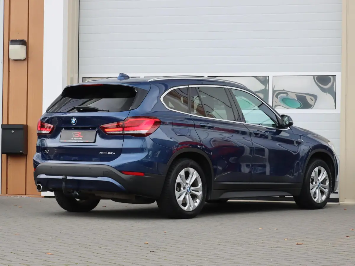 xDrive25e High Executive | SOH 86% | Panoramadak | Afneembare trekhaak