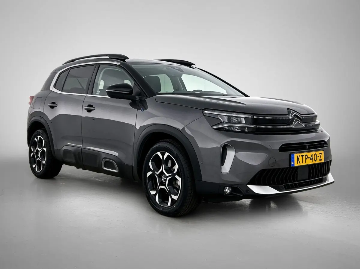 1.6 225pk Plug-in Hybrid Business Plus Automaat | Navigatie | Climate Control | Adaptieve Cruise Control | Camera Voor + Achter | Elektrische Klep | 18"LMV |