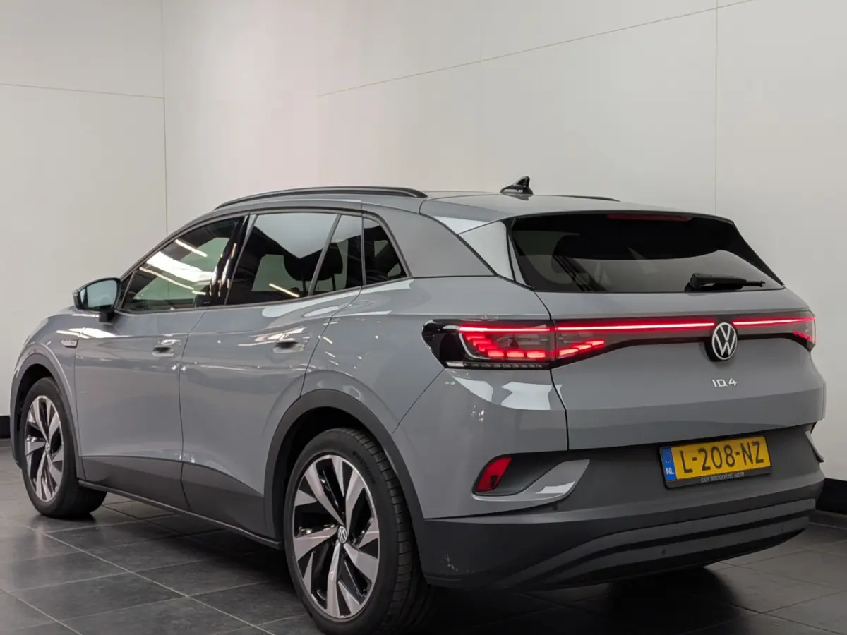 Tech 77 kWh 204 pk | SoH 93,44% | Elektrische stoel | Stoel/stuur verwarming | HUD |