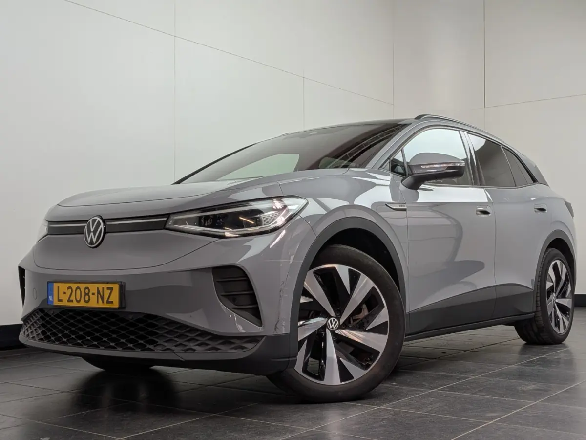 Tech 77 kWh 204 pk | SoH 93,44% | Elektrische stoel | Stoel/stuur verwarming | HUD |
