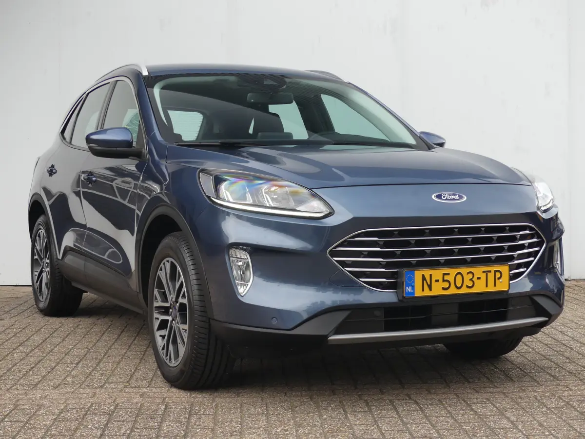 2.5 PHEV Titanium | TREKHAAK | STUUR+STOEL+VOORRUITVERWARMING | CAMERA | PARKEERSENSOREN V+A | NAVI | LMV 18" | APPLE CARPLAY / ANDROID AUTO |
