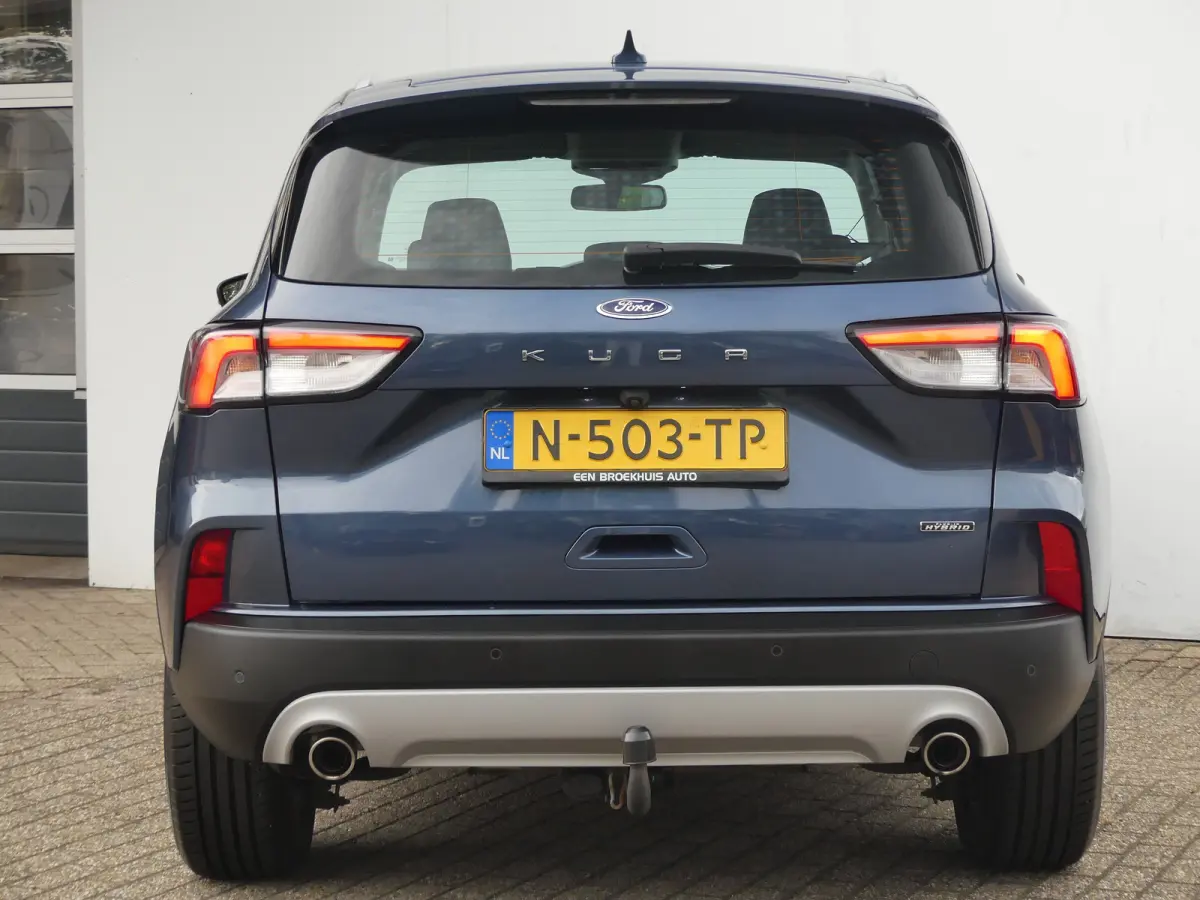 2.5 PHEV Titanium | TREKHAAK | STUUR+STOEL+VOORRUITVERWARMING | CAMERA | PARKEERSENSOREN V+A | NAVI | LMV 18" | APPLE CARPLAY / ANDROID AUTO |