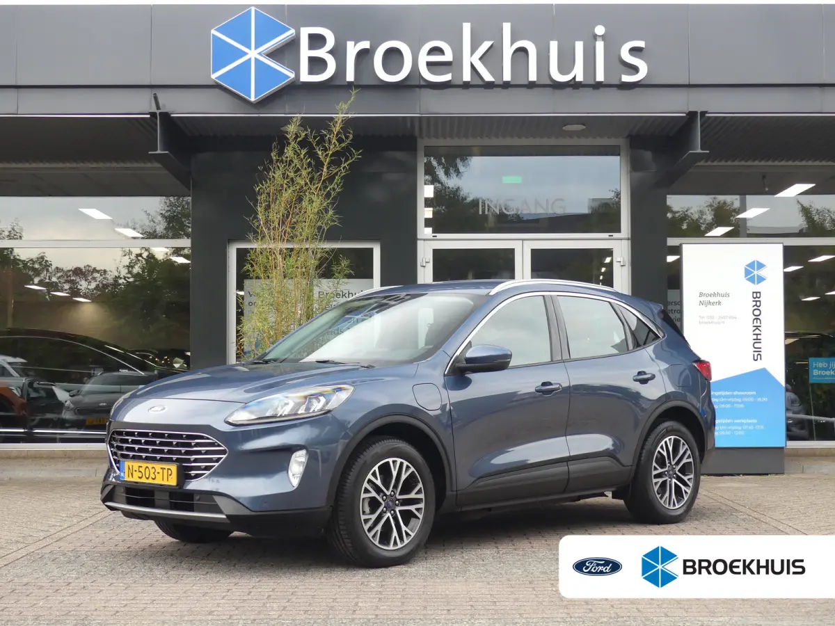 2.5 PHEV Titanium | TREKHAAK | STUUR+STOEL+VOORRUITVERWARMING | CAMERA | PARKEERSENSOREN V+A | NAVI | LMV 18" | APPLE CARPLAY / ANDROID AUTO |