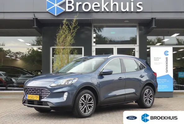 2.5 PHEV Titanium | TREKHAAK | STUUR+STOEL+VOORRUITVERWARMING | CAMERA | PARKEERSENSOREN V+A | NAVI | LMV 18" | APPLE CARPLAY / ANDROID AUTO |