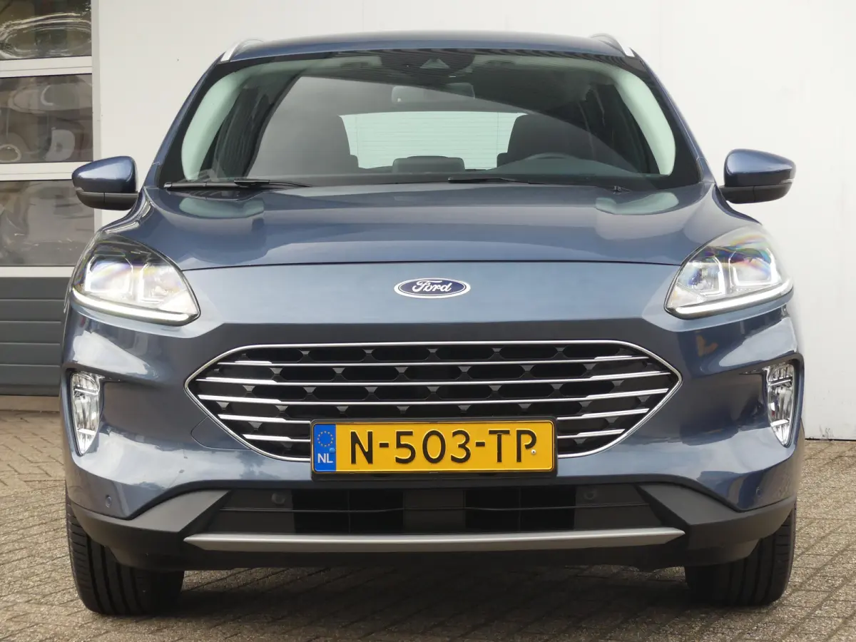 2.5 PHEV Titanium | TREKHAAK | STUUR+STOEL+VOORRUITVERWARMING | CAMERA | PARKEERSENSOREN V+A | NAVI | LMV 18" | APPLE CARPLAY / ANDROID AUTO |