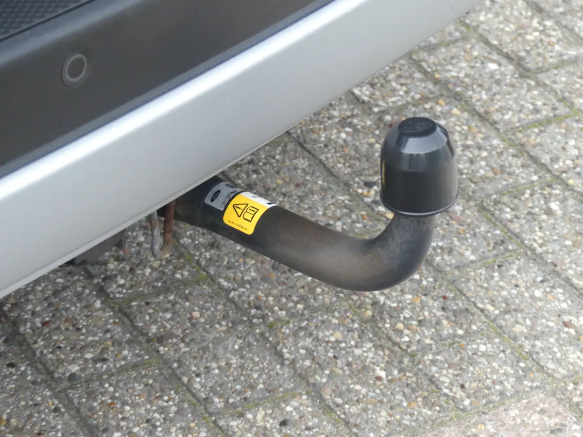 2.5 PHEV Titanium | TREKHAAK | STUUR+STOEL+VOORRUITVERWARMING | CAMERA | PARKEERSENSOREN V+A | NAVI | LMV 18" | APPLE CARPLAY / ANDROID AUTO |