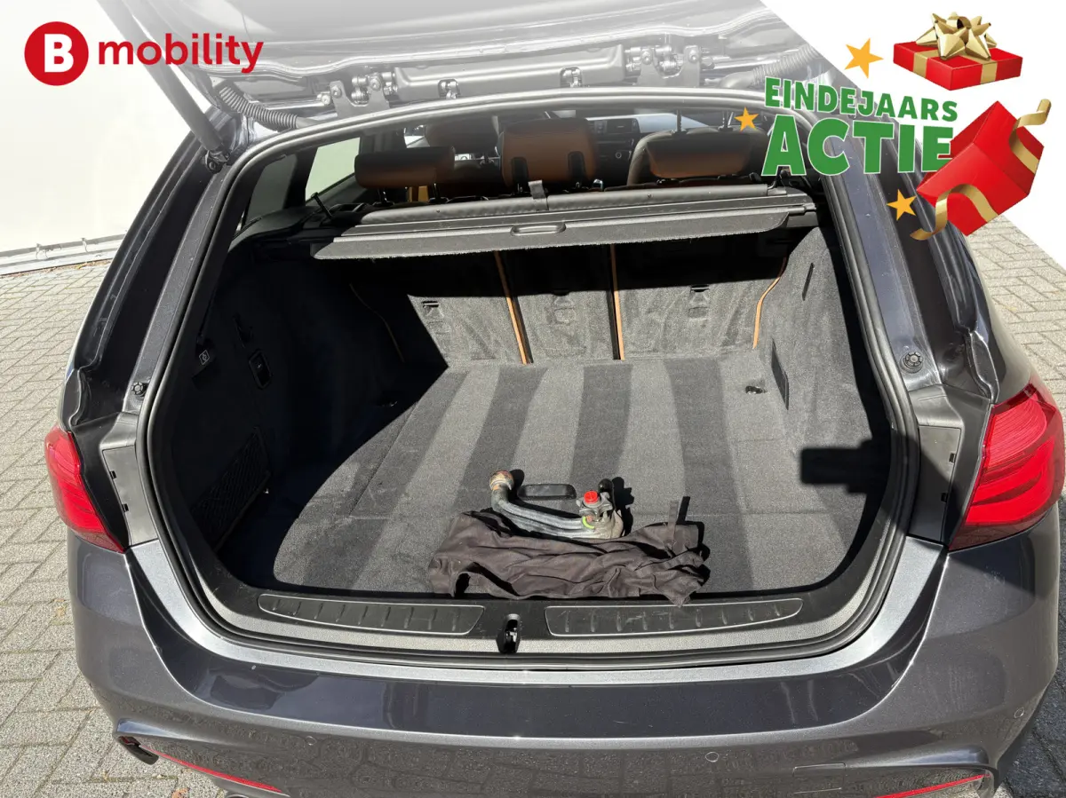 318i High Executive M-Sport Trekhaak Apple CarPlay | Achteruitrijcamera | HIFI | Leer | DAB Audio