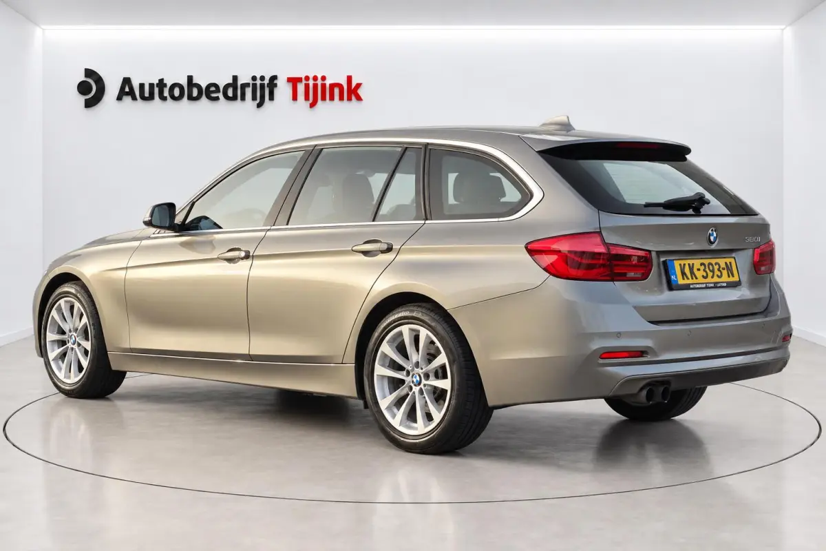 320i Centennial High Executive | Automaat | Navi | Stoelverwarming | LED | Cruise | PDC |
