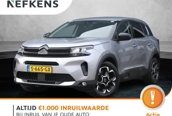 225pk Plug-in Hybrid Feel | 1ste eigenaar | Camera | Dodehoekdetectie | LED lampen | LEER/Stof | 18"LMV | AUTOMAAT