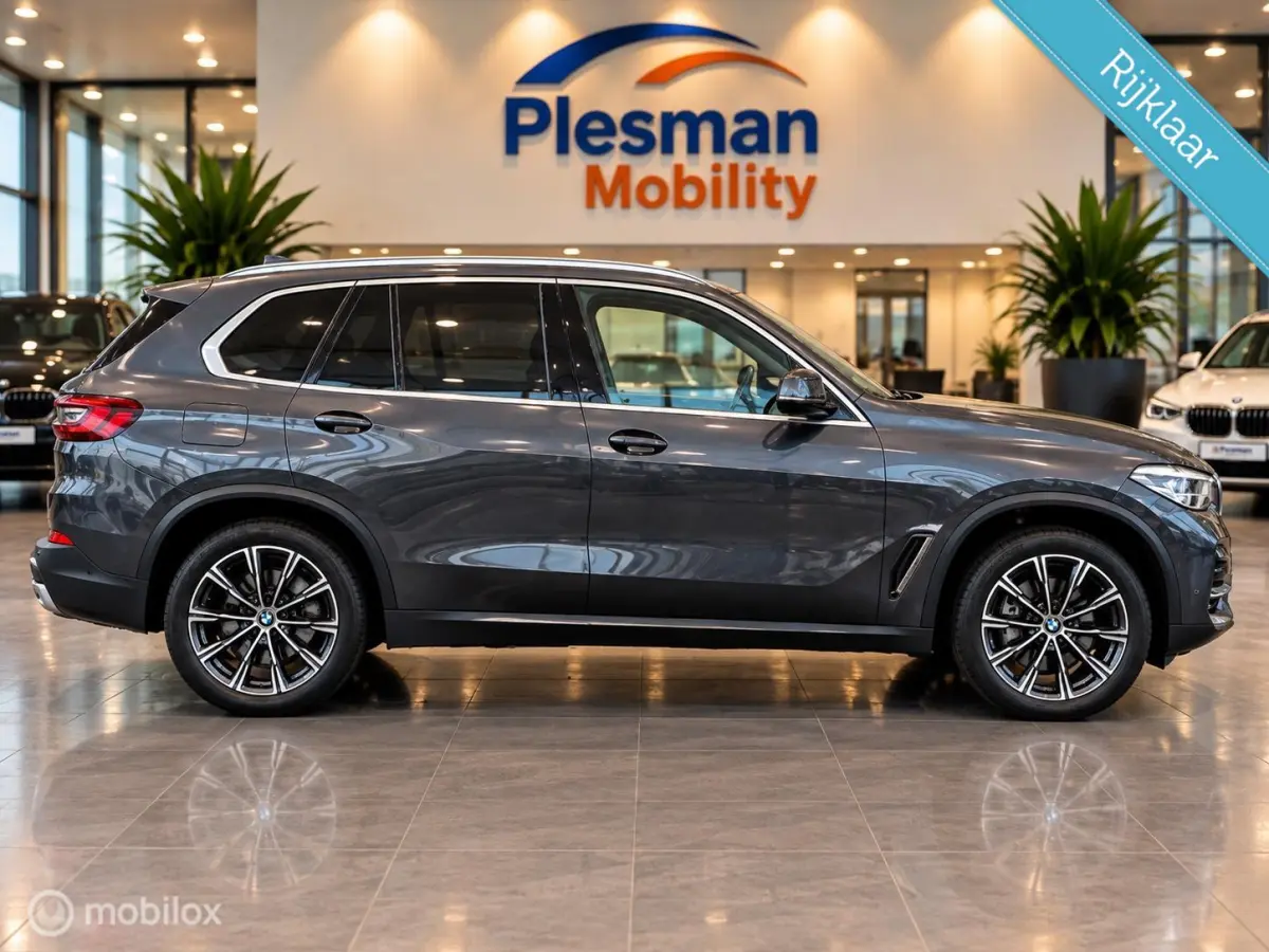 xDrive45e High Executive|Luchtvering|Open Panodak|BTW