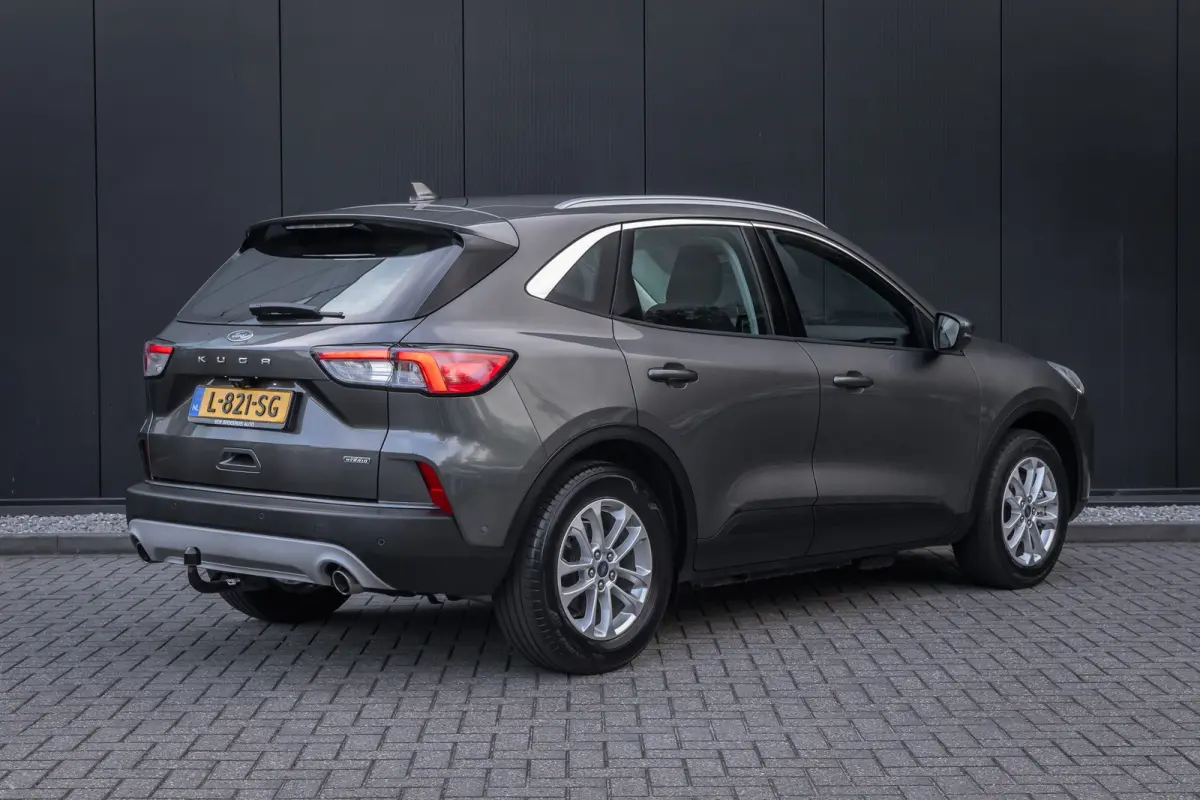 2.5 PHEV Titanium | 100% dealer o.h. | Trekhaak | Adaptieve cruise | Standkachel | Parkeercamera | Apple carplay / andriod auto