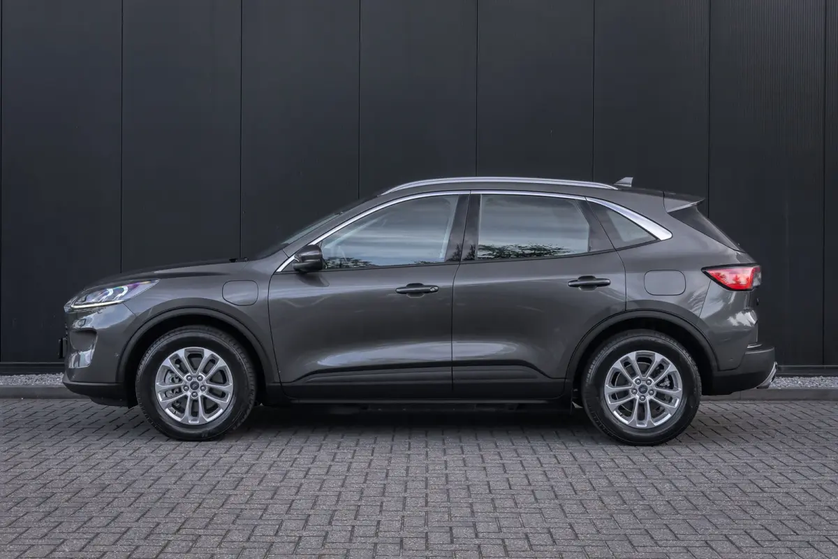 2.5 PHEV Titanium | 100% dealer o.h. | Trekhaak | Adaptieve cruise | Standkachel | Parkeercamera | Apple carplay / andriod auto
