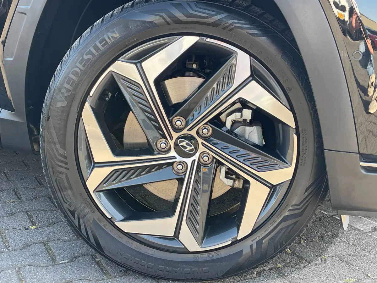 1.6 T-GDI PHEV Premium Sky 4WD | Pano | Leder | LED