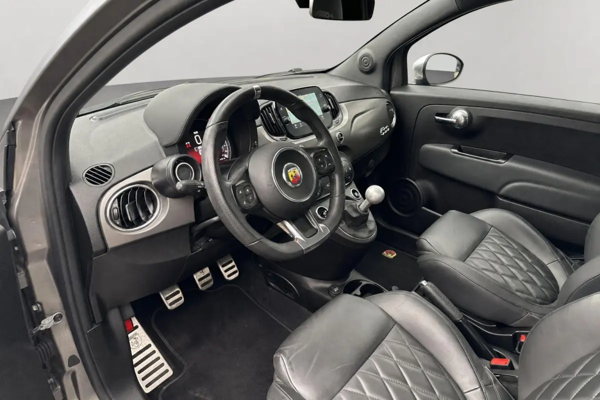 595 1.4 T-Jet Abarth 165pk Turismo | Navigatie | Lederen bekleding | Climate Control | LMV 17"|