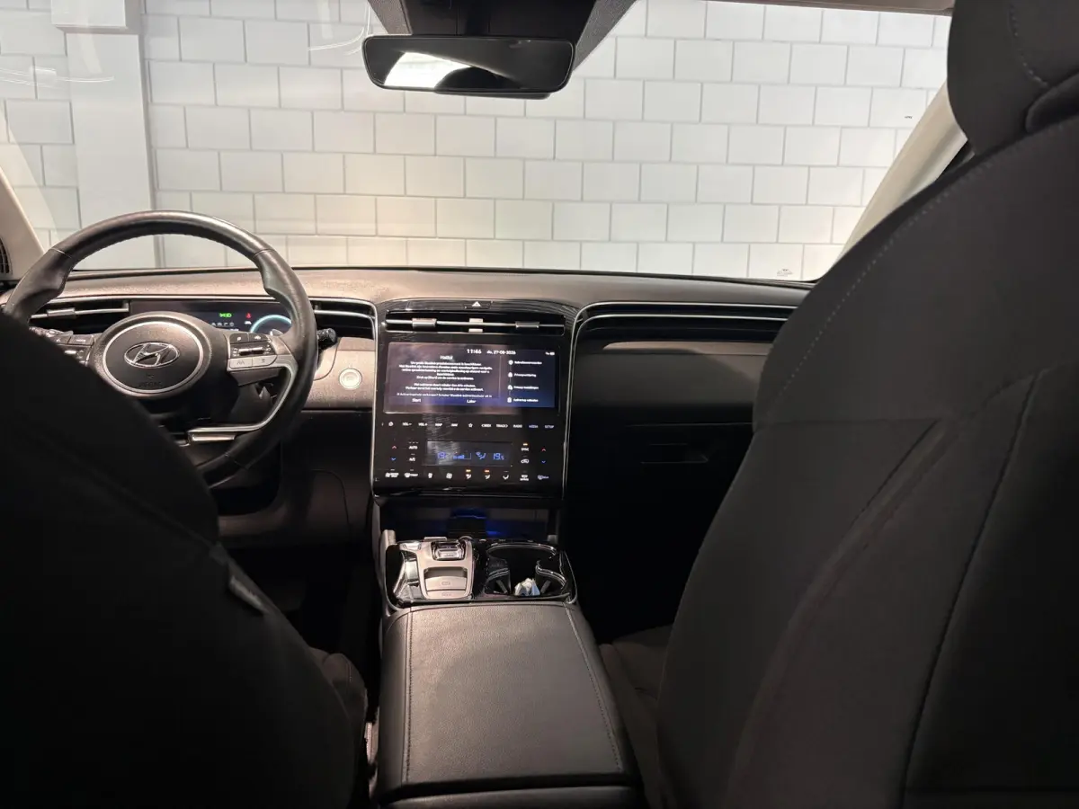 1.6 T-GDI PHEV Comfort 4WD | Achteruitrijcamera | Navigatie | Apple CarPlay | 19" LMV