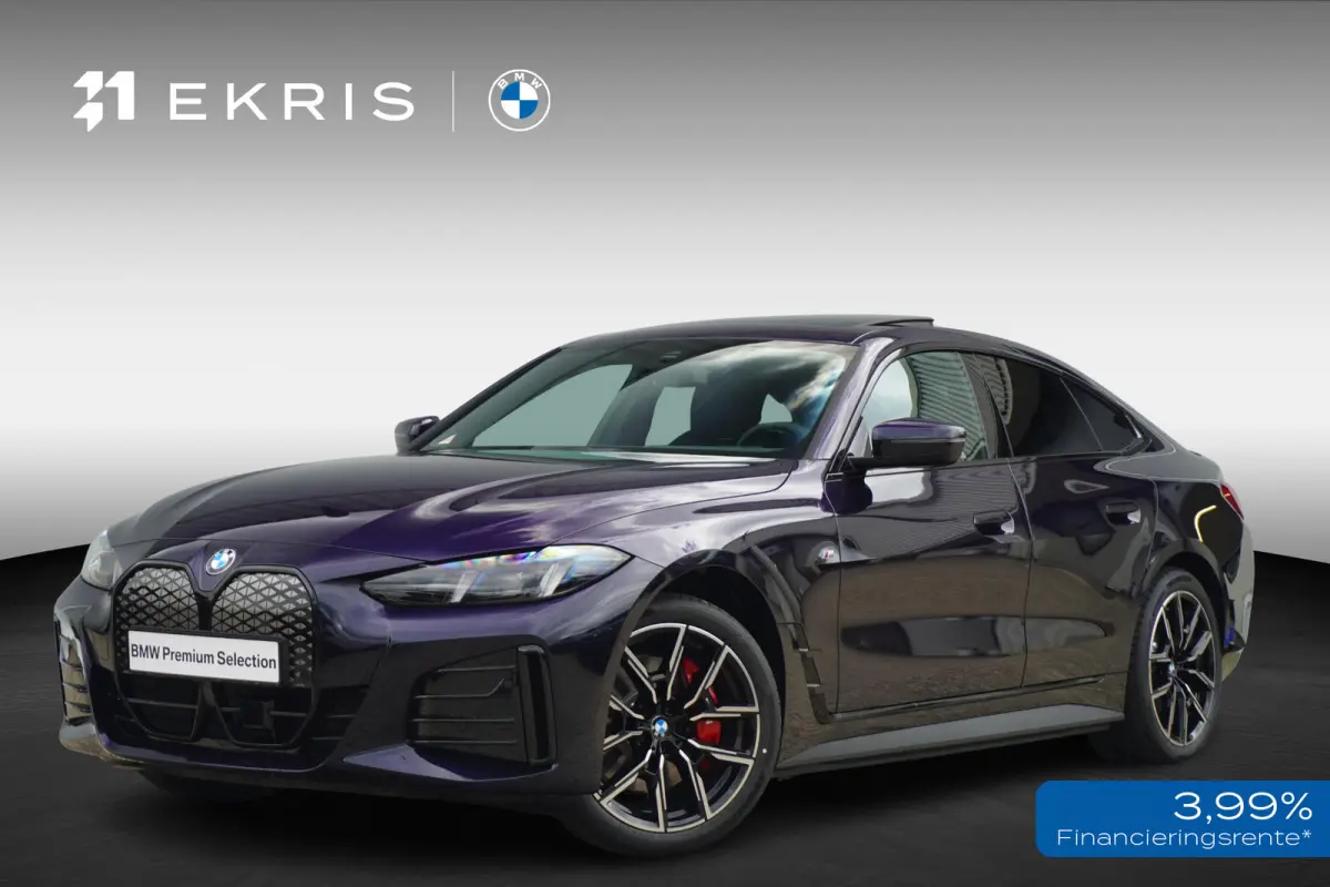 eDrive40 | M Sportpakket Pro | Harman Kardon | Active Cruise Control | Elektrisch verstelbare stoelen | Trekhaak