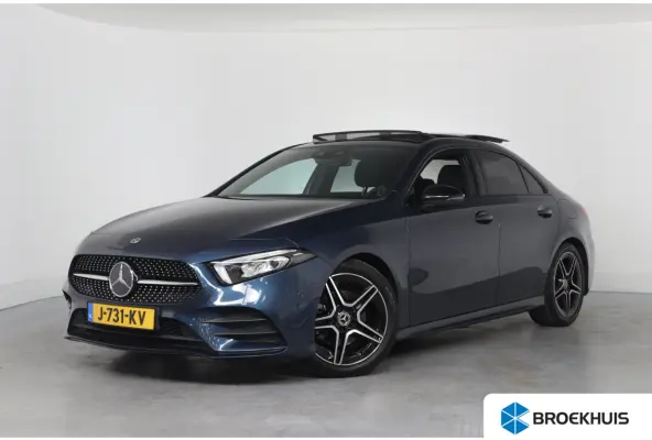 180 Business Solution AMG | Open Dak | Trekhaak | Sfeerverlichting | Sportstoelen | Camera | Clima | Navi | Stoelverwarming | LED | DAB | Lichtmetalen Velgen | Parkeersensoren V+A