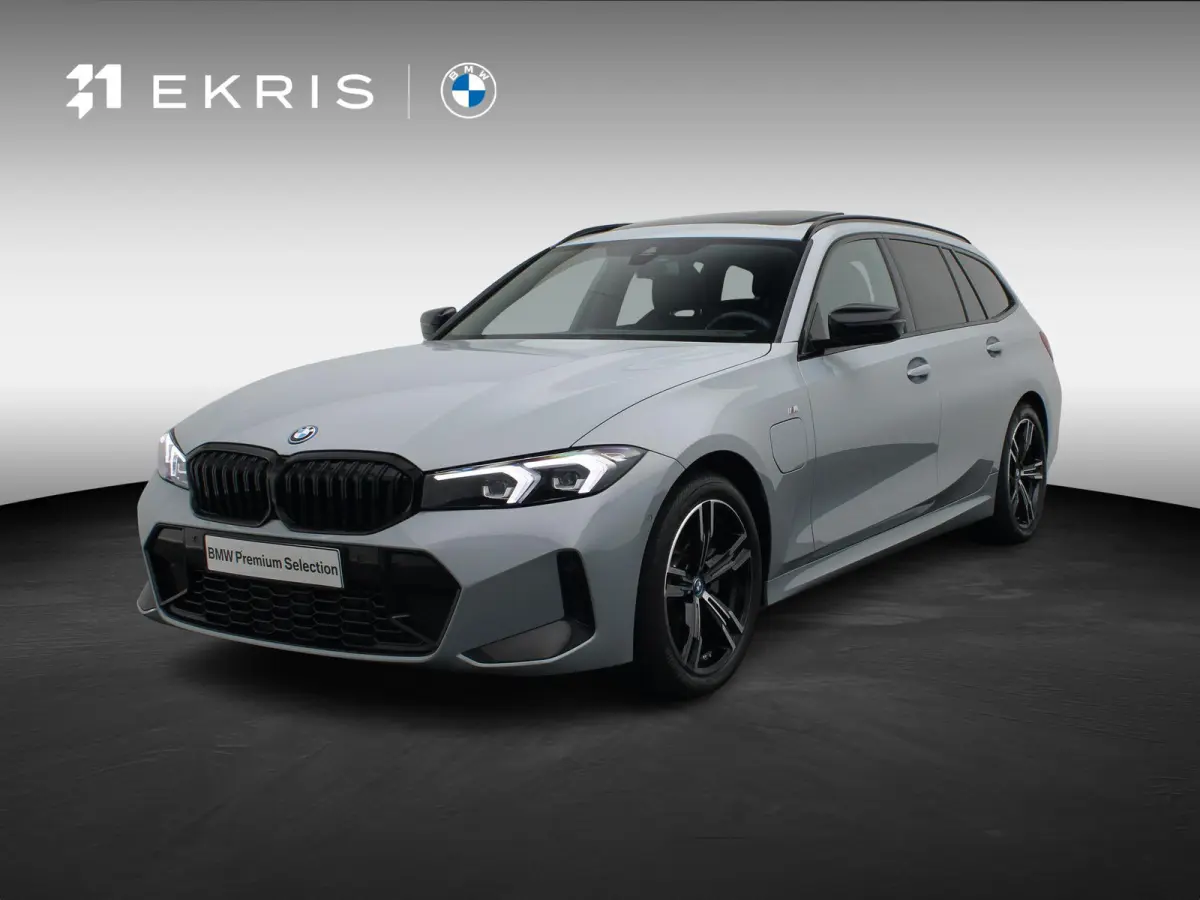 320e M Sportpakket | Travel Pack | Entertainment Pack | SoH 82% | Stuurwielrand Verwarmd | Panoramadak | Driving Assistant | 18''