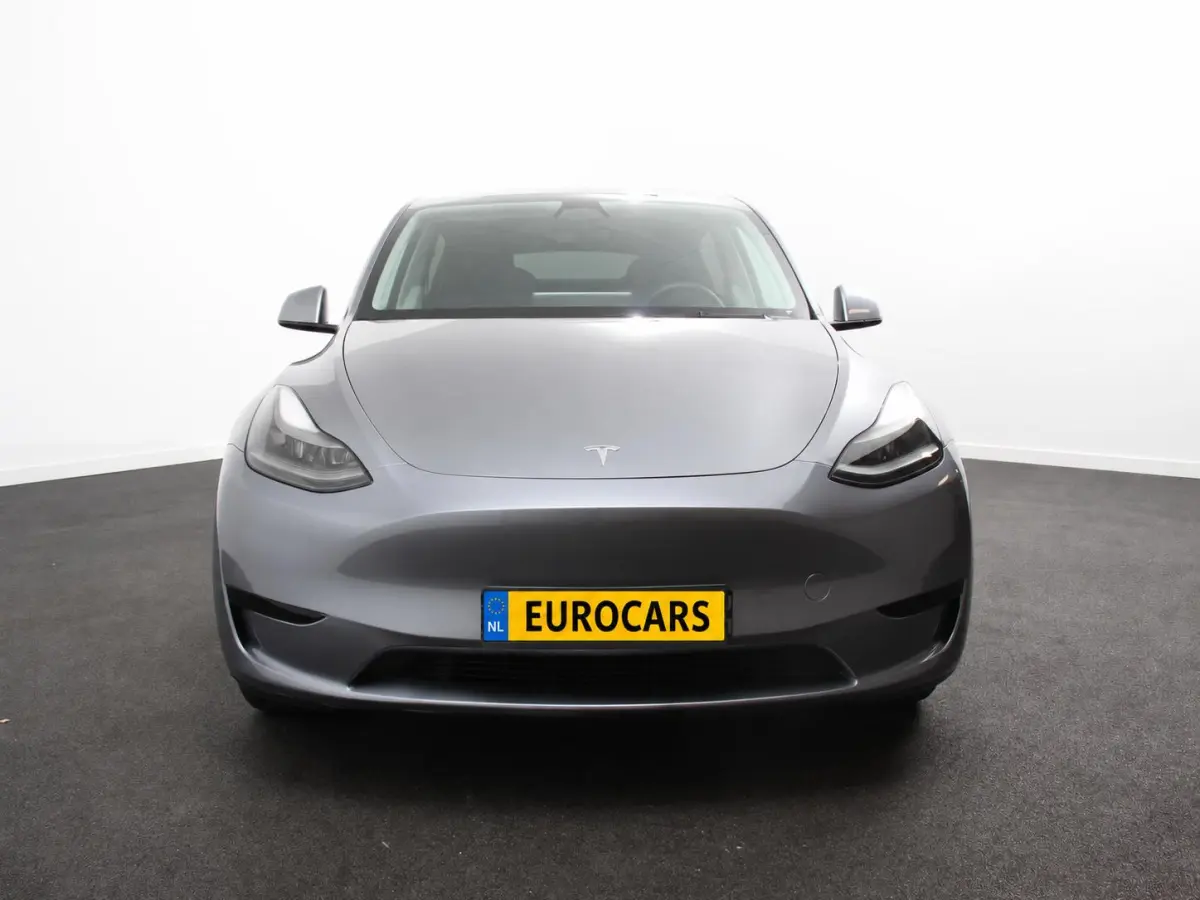 Long Range AWD 75 kWh SOH 93% Climate control Adaptieve cruise control Achteruitrijcamera Panoramadak Keyless Stuurverwarming Stoelverwarming LED Navigatie Parkeersensoren