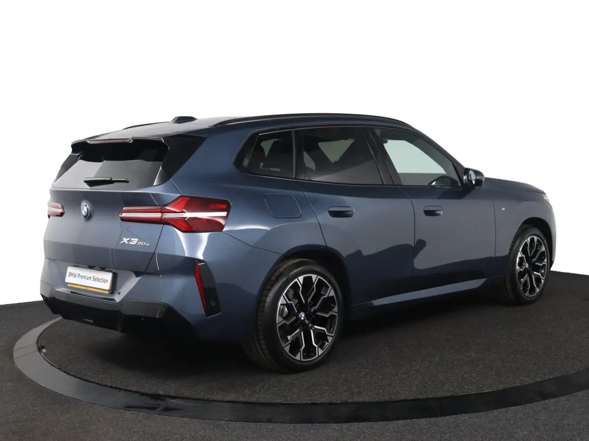 30e xDrive | SOH 100% | M Sportpakket | Premium Pack | Trekhaak  | Panoramadak | Harman Kardon | Parking Assistant