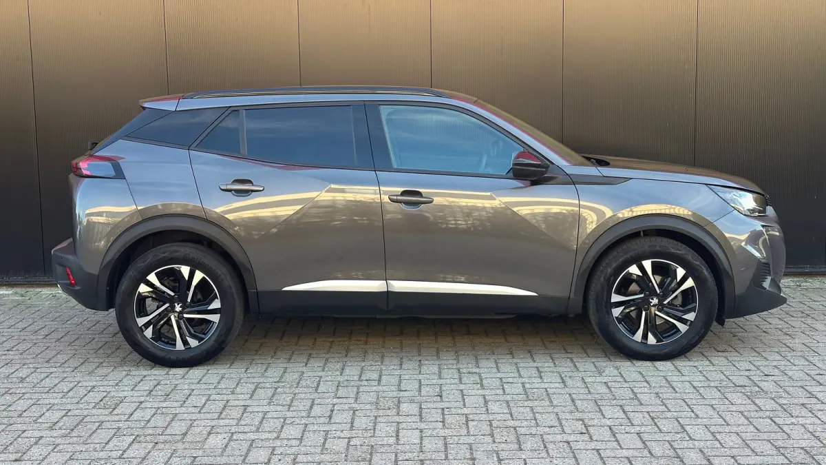 1.2 PureTech Allure Pack | Apple Carplay / Android Auto | Navigatie | Trekhaak | Achteruitrij Camera | Climate Control | | Achterbank in delen neerklapbaar | Achteruitrijcamera | Airco (auto