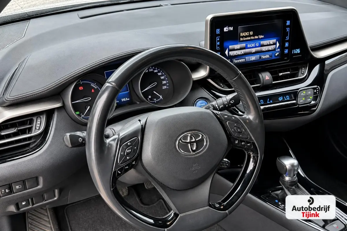 1.8 Hybrid Dynamic | LED | Trekhaak | Camera | Stoelverwarming | All-seasons | Navi | Keyless |