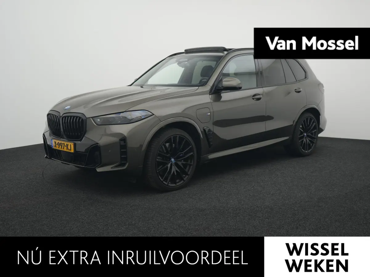 xDrive50e Launch Edition BTW AUTO | PANORAMADAK | LUCHTVERING | HARMAN KARDON | STOELKOELING & VERWARMING | MASSAGE | CARBON PAKKET | ALCANTARA HEMEL | TREKHAAK | MEMORY | HEAD-UP | ADAPTIEV
