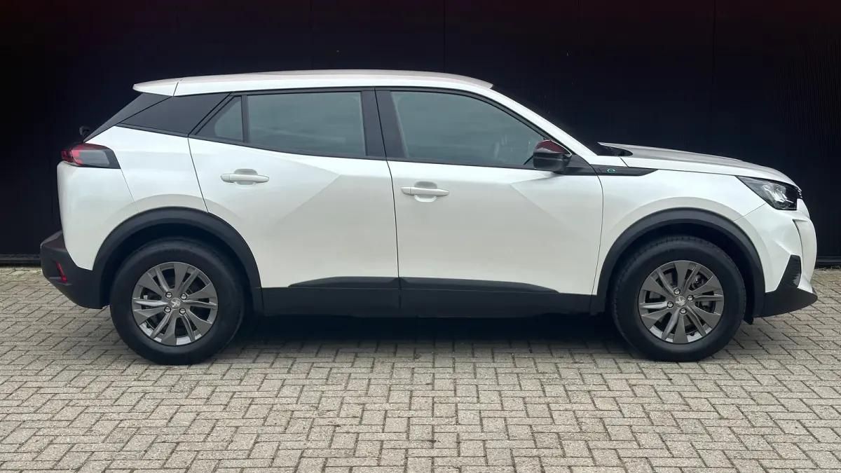 EV Active Pack 50 kWh | Navigatie | Camera | Apple Carplay / Android Auto | SOH 97,56% | Achterbank in delen neerklapbaar | Achteruitrijcamera | Airco (automatisch)