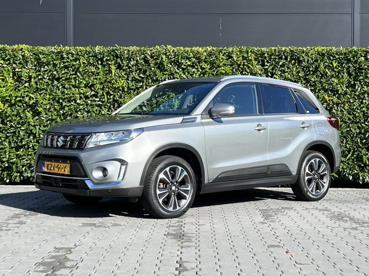 1.4 Boosterjet Style Smart Hybrid, 1E EIGENAAR, PANORAMADAK, NAVIGATIE, ADAPT. CRUISE, CLIMATE CONTROL, STOELVERWARMING, KEYLESS, CAMERA, PDC, LED, DAB, DEALER ONDERHOUDEN, LICHTMETAAL 17"