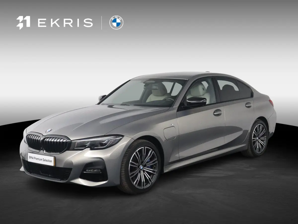 330e Business Edition Plus | M Sport | Trekhaak Elektrisch | Volleder | SoH 95% | Stuur- & Stoelverwarming | Stoelverwarming | Carbon Interieur | Driving Assistant Professional | Laserlight 