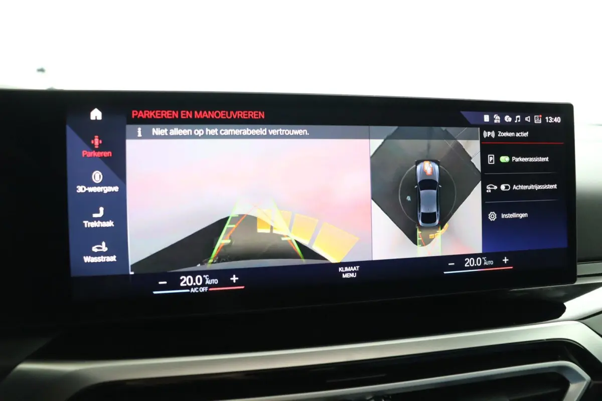 eDrive40 High Executive 84 kWh | Glazen Schuif-/kanteldak | Trekhaak Elektrisch | Volleder Individual + leder dashboard | Stoelverwarming | Driving Assistant Professional | 360 camera | Head