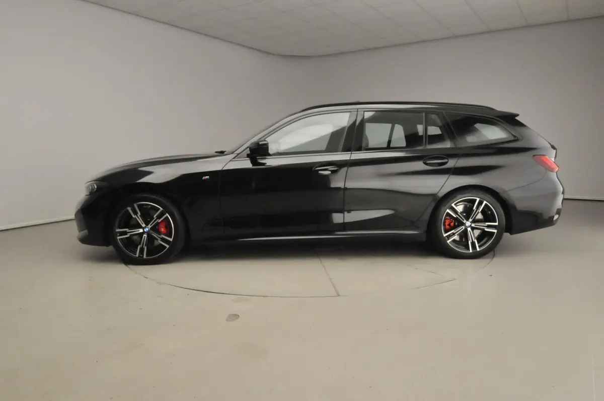 318i | M-Sportpakket | LED | Navigatie | Trekhaak | Panoramadak | Stoelverwarming | DAB | Alu 18 inch