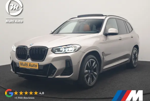 M Sport 80 kWh 286pk Dealer O.H | Panodak | Adaptive Cruise | Camera | Lederen Sportstoelen Memory & Verwarmd | Sfeerverlichting | Blis | Apple Carplay | Navigatie | DAB | 19"L.M