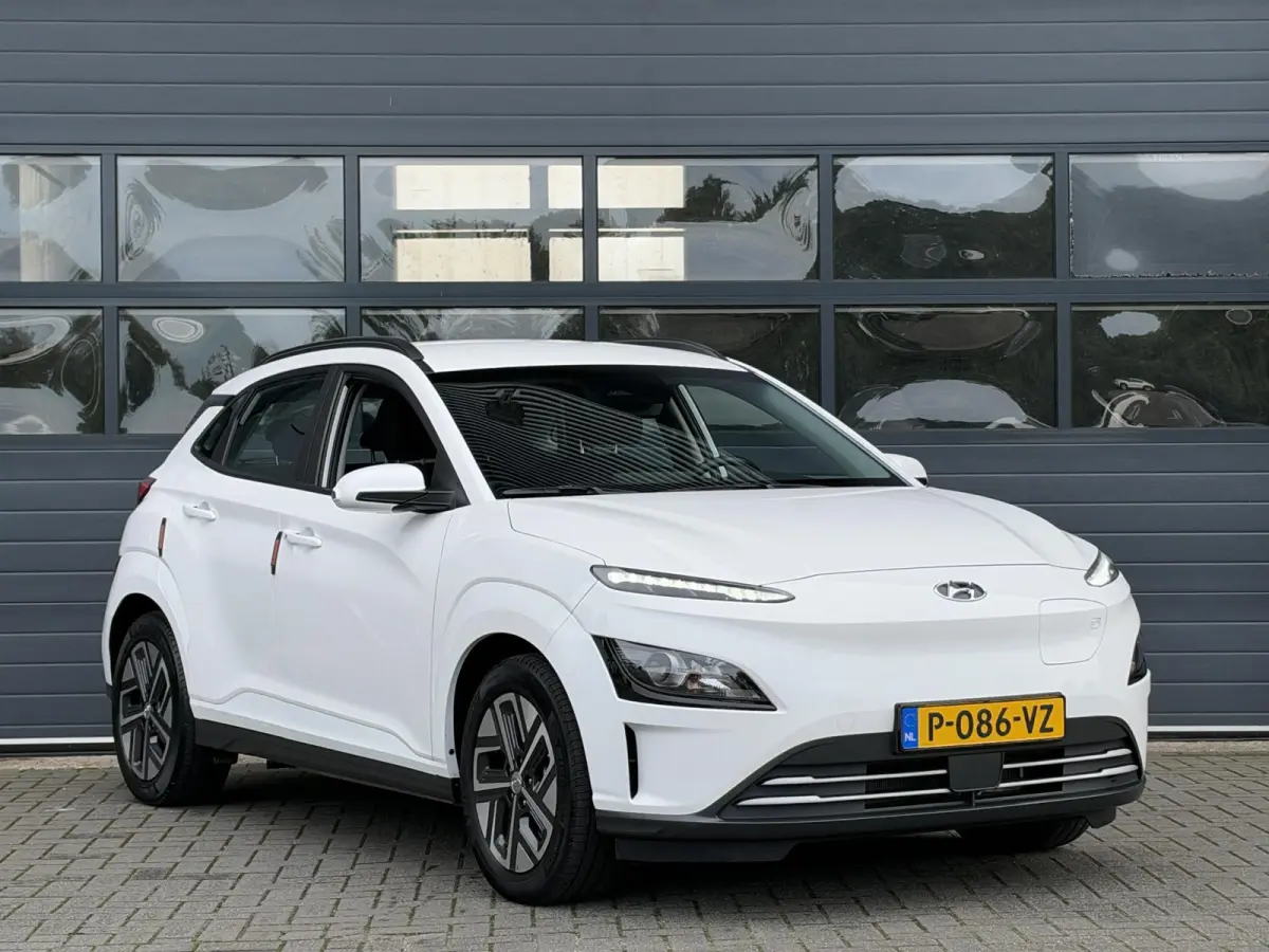 EV COMFORT 64 kWh (99% SOH) I AUTOMAAT I TREKHAAK I APPLE CARPLAY I P-CAMERA
