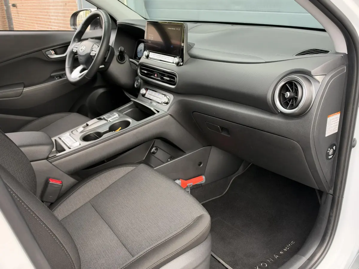 EV COMFORT 64 kWh (99% SOH) I AUTOMAAT I TREKHAAK I APPLE CARPLAY I P-CAMERA