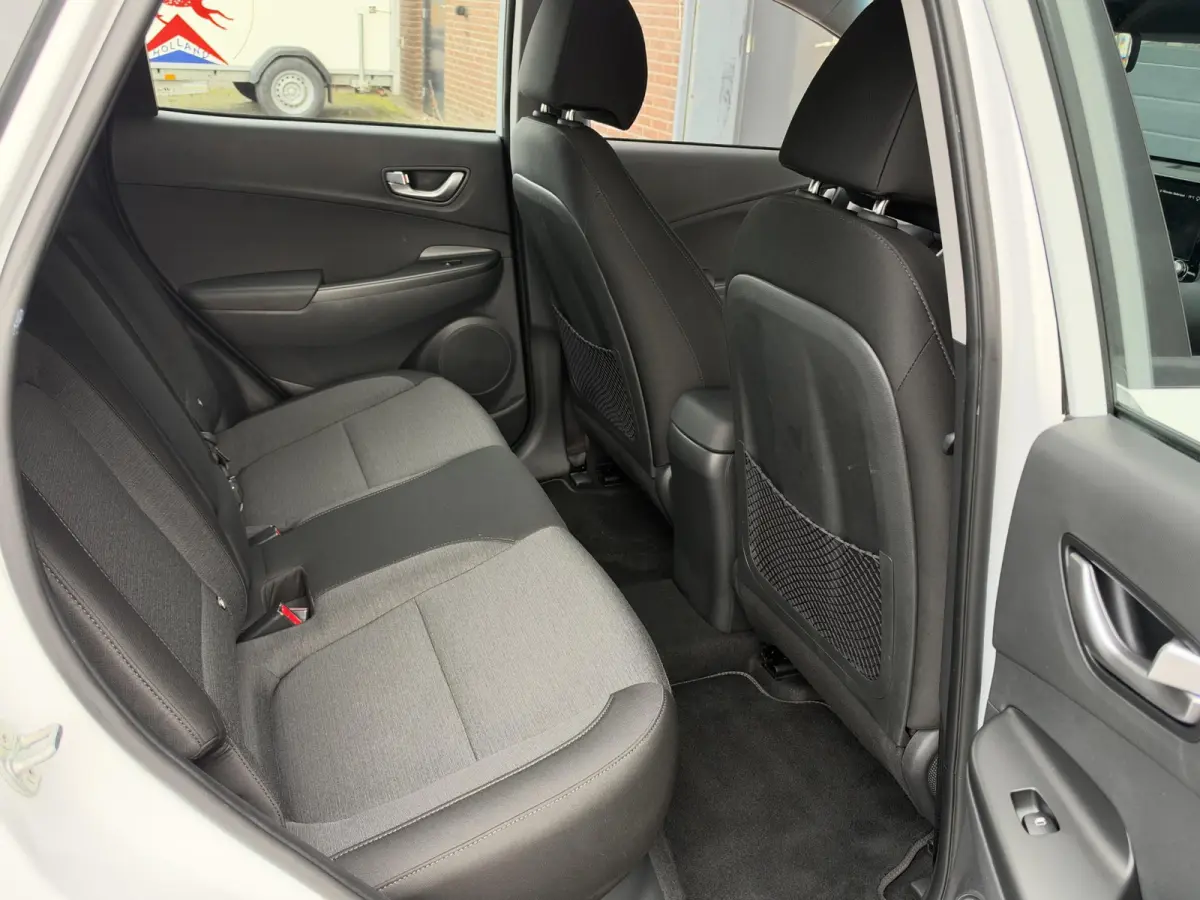 EV COMFORT 64 kWh (99% SOH) I AUTOMAAT I TREKHAAK I APPLE CARPLAY I P-CAMERA