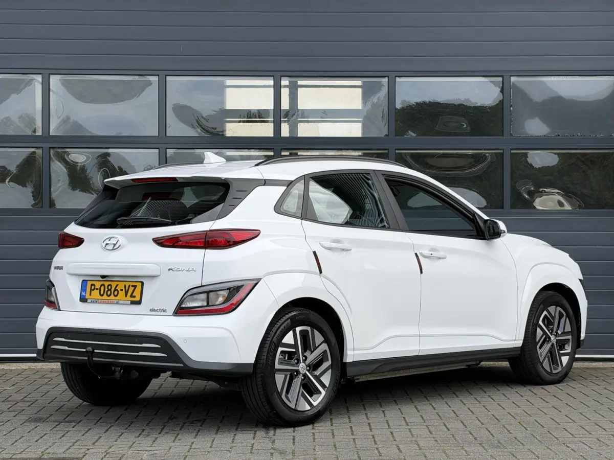 EV COMFORT 64 kWh (99% SOH) I AUTOMAAT I TREKHAAK I APPLE CARPLAY I P-CAMERA