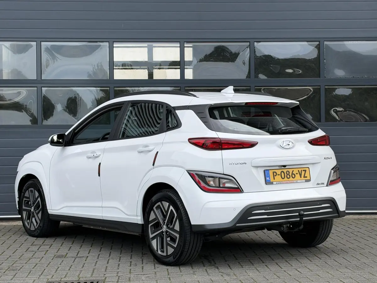 EV COMFORT 64 kWh (99% SOH) I AUTOMAAT I TREKHAAK I APPLE CARPLAY I P-CAMERA